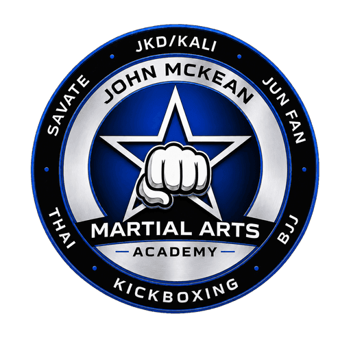 John McKean Martial Arts Academy crest