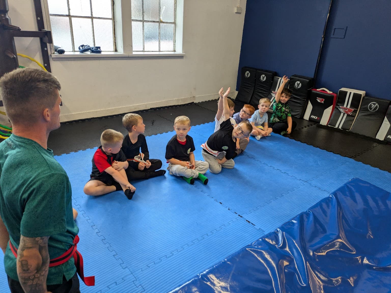 Children taking part in a Mini Martial Arts class at John McKean Academy